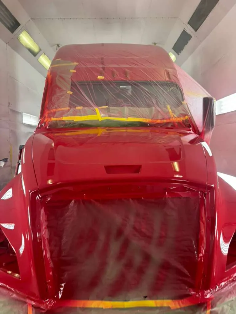 Final high-gloss red finish on the cab and hood 3