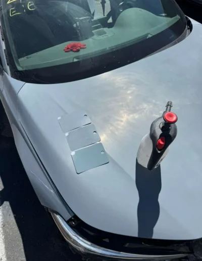 Showing color swatches on the hood to ensure a perfect factory match